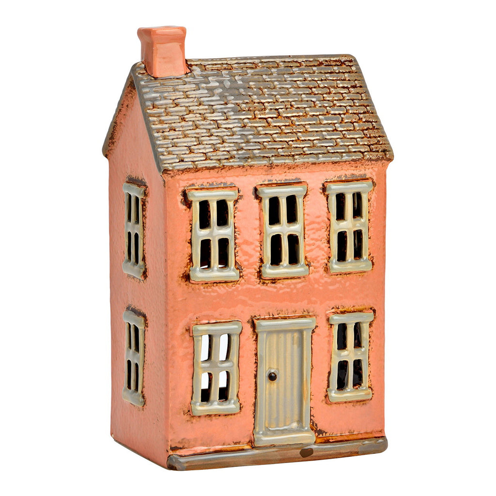 Casa portavelas rosa de porcelana