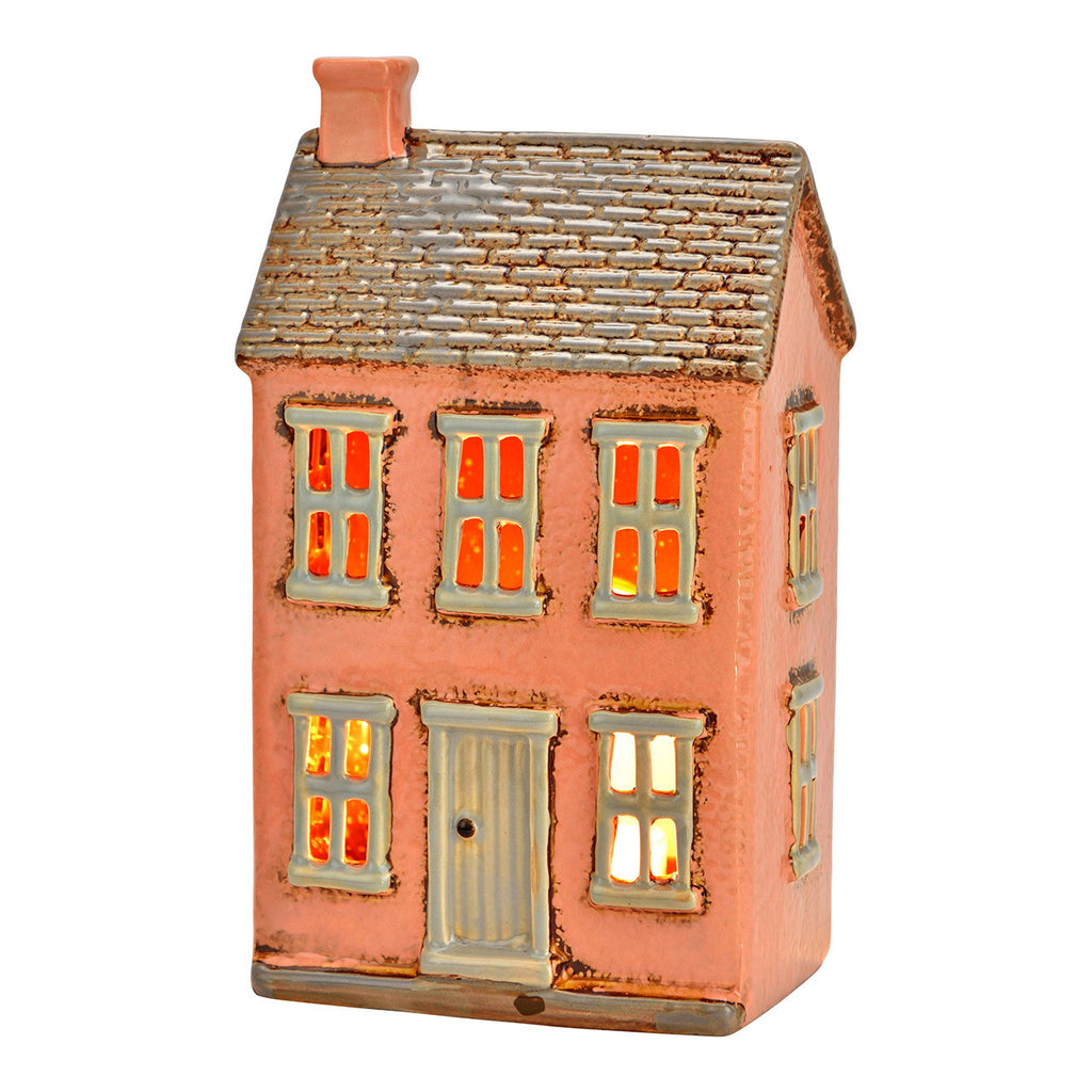 Casa portavelas rosa de porcelana